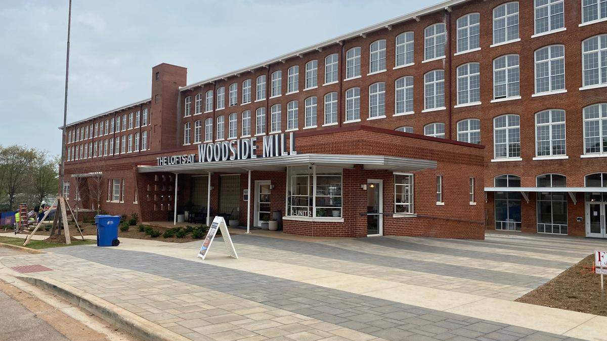 The Lofts at Woodside Mill is the latest renovation of a textile mill into apartments.