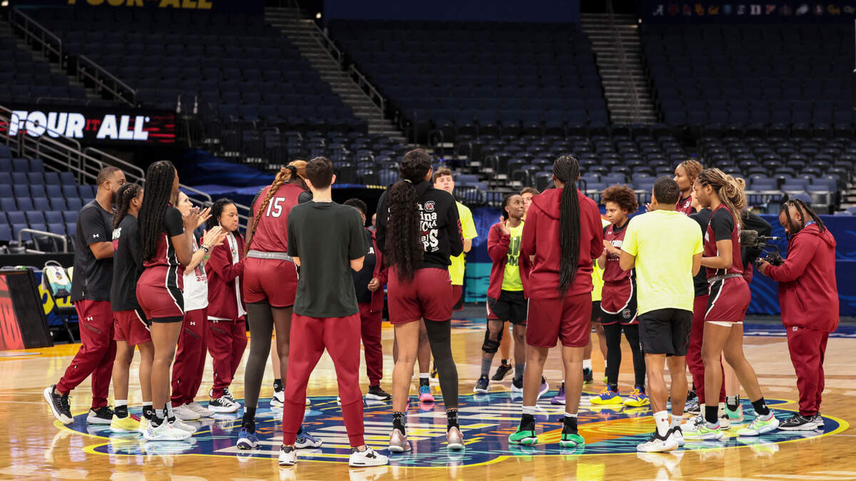 The University of South Carolina Gamecocks huddle at center court at the Amalie Arena in Tampa Florida on Thursday, April 3, 2025. The Gamecocks play Texas in the semifinal round of the NCAA Tournament.