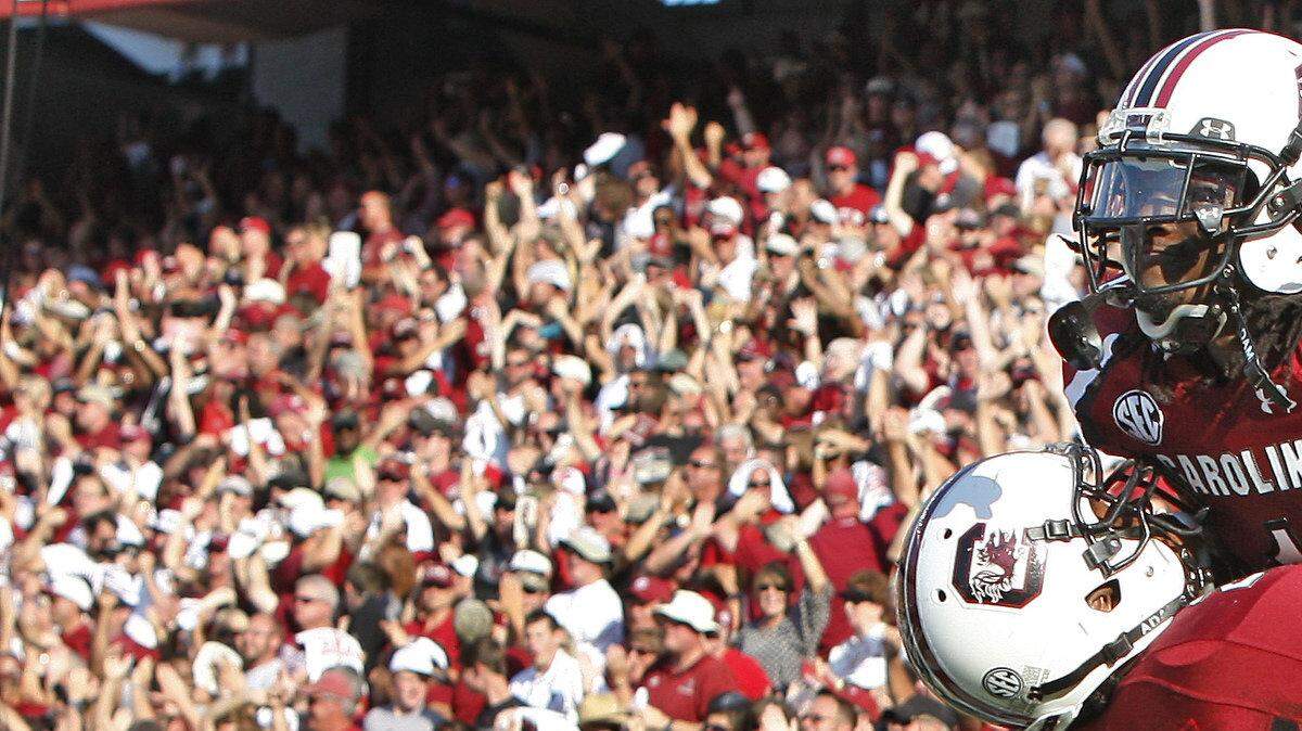 South Carolina Gamecocks wide receiver Ace Sanders (1) celebrates his touchdown grab with running back Marcus Lattimore (21) in the second quarter of the Gamecocks game against Missouri at Williams-Brice Stadium in Columbia, SC.
