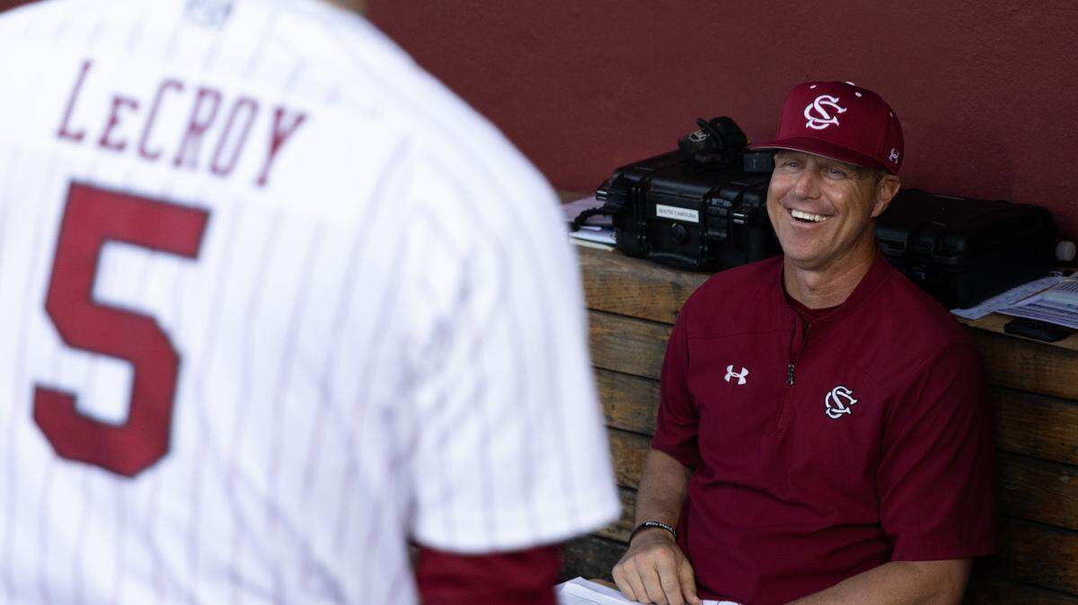 South Carolina head coach Mark Kingston jokes with catcher Talmadge LeCroy (5) before the Gamecocks’ game against Missouri at Founders Park in Columbia on Friday, March 24, 2023.