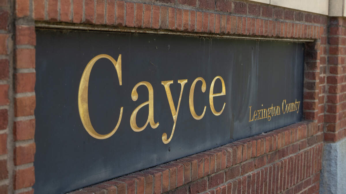 The entrance of Cayce is marked with a sign on Knox Abbot Drive on Tuesday, May, 20, 2025.