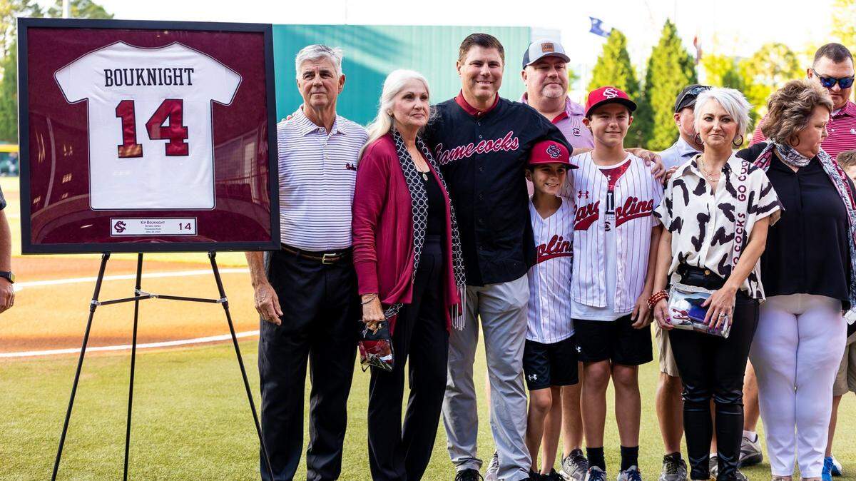 Kip Bouknight stands with members of his family as his jersey is retired before the Gamecocks game at Founders Park in Columbia, SC, Friday, April 28, 2023.