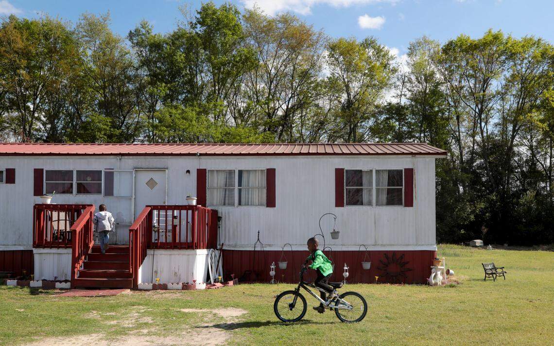 Children have been raised adjacent to Darlington County farm fields where farmers spread contaminated sludge from the Galey and Lord textile plant. Wells, like the one serving this mobile home, were polluted with forever chemicals. Photo from March 2023.