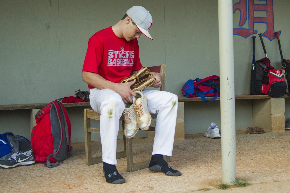 Hammond's Reece Holbrook packs up after practice at Hammond School on Wednesday April 11, 2018, in Columbia, SC. Holbrook is the son of former USC baseball coach, Chad Holbrook, and will be following in his father's footsteps to play for UNC at Chapel Hill. Reece's connection with the university goes back to his childhood when he was treated there for acute lymphoblastic leukemia.
