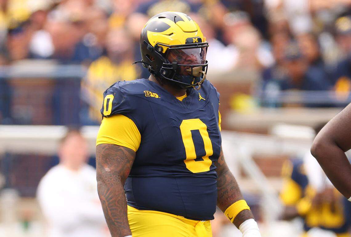 Michigan defensive tackle Tré Williams (0)