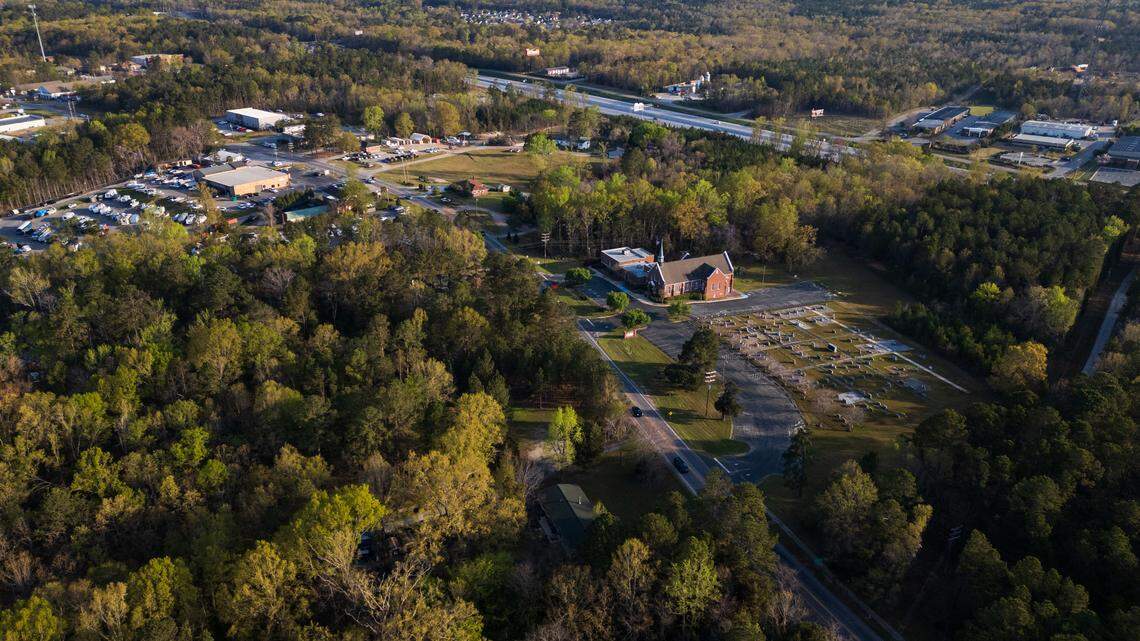 Bethlehem Lutheran Church and businesses on Broad River Road in Irmo, South Carolina, from the air on Friday, March 28, 2025.