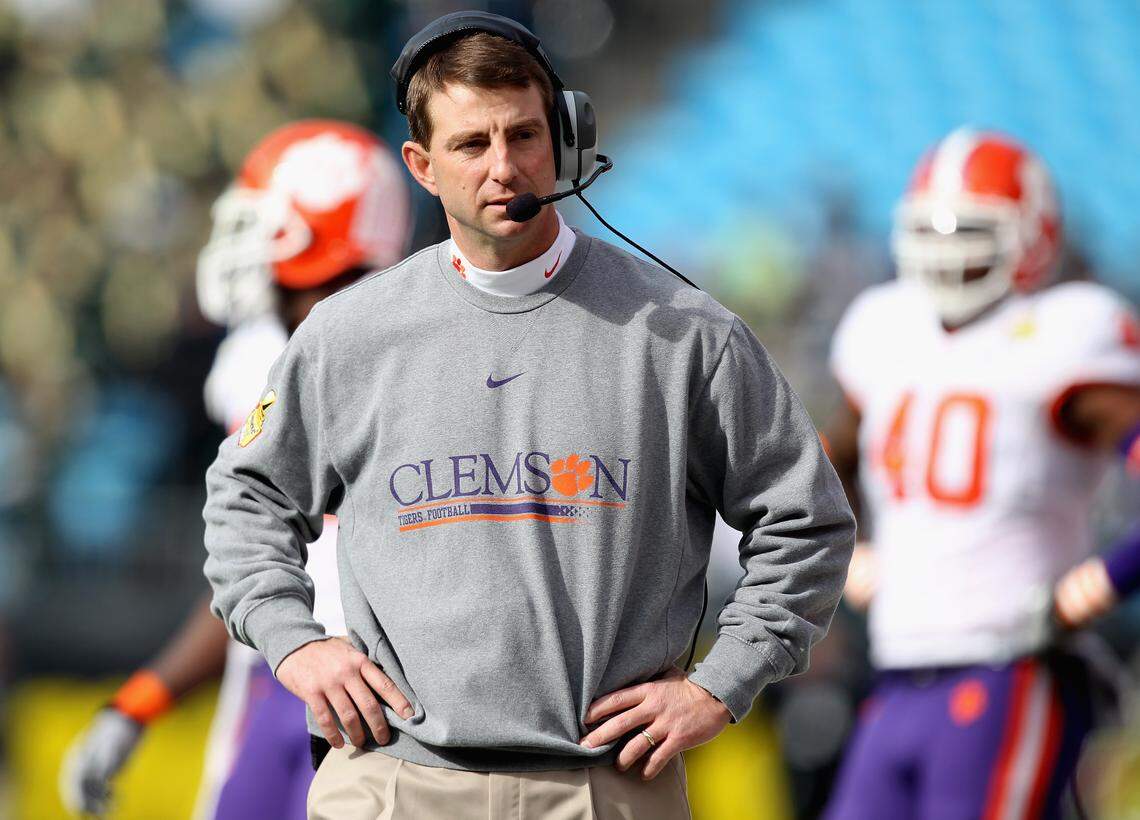 Head coach Dabo Swinney of the Clemson Tigers reacts to his teams 31-26 loss to the USF Bulls during their game at Bank of America Stadium on December 31, 2010 in Charlotte, North Carolina.