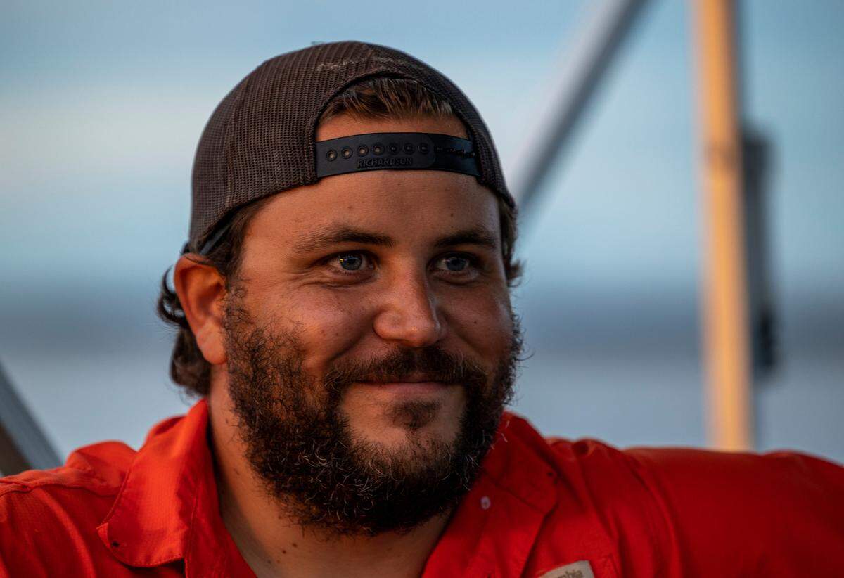 Wildlife specialist Zach Steinhauser takes visitors out on Lake Murray to see the Purple Martins flocking to Bomb Island. He has produced a documentary about the birds.