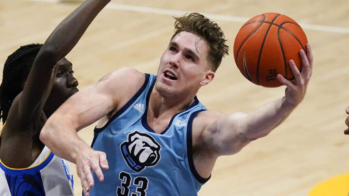 Citadel’s Hayden Brown, right, shoots as Pittsburgh’s Mouhamadou Gueye defends during the second half of an NCAA college basketball game, Tuesday, Nov. 9, 2021, in Pittsburgh.