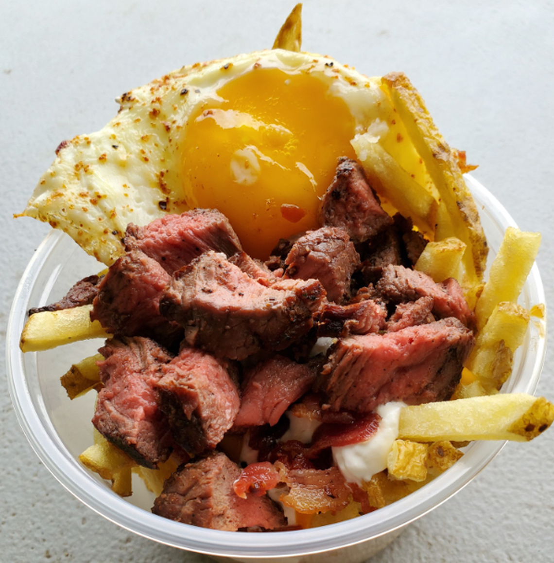 The “Steak N Eggs Sundae” from DeAnna’s Food Concessions is a new addition to the menu at the South Carolina State Fair.