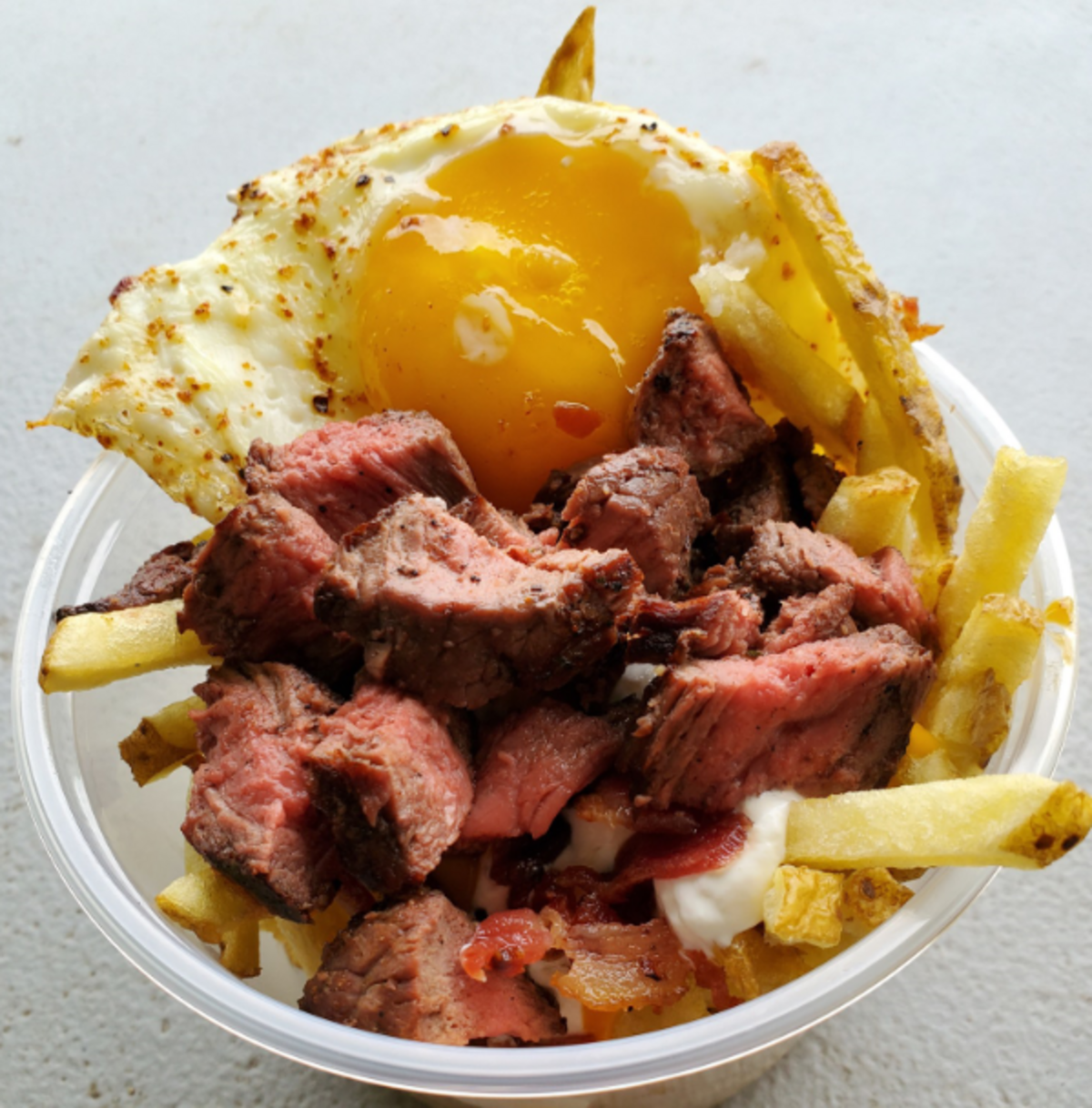 The “Steak N Eggs Sundae” from DeAnna’s Food Concessions is a new addition to the menu at the South Carolina State Fair.
