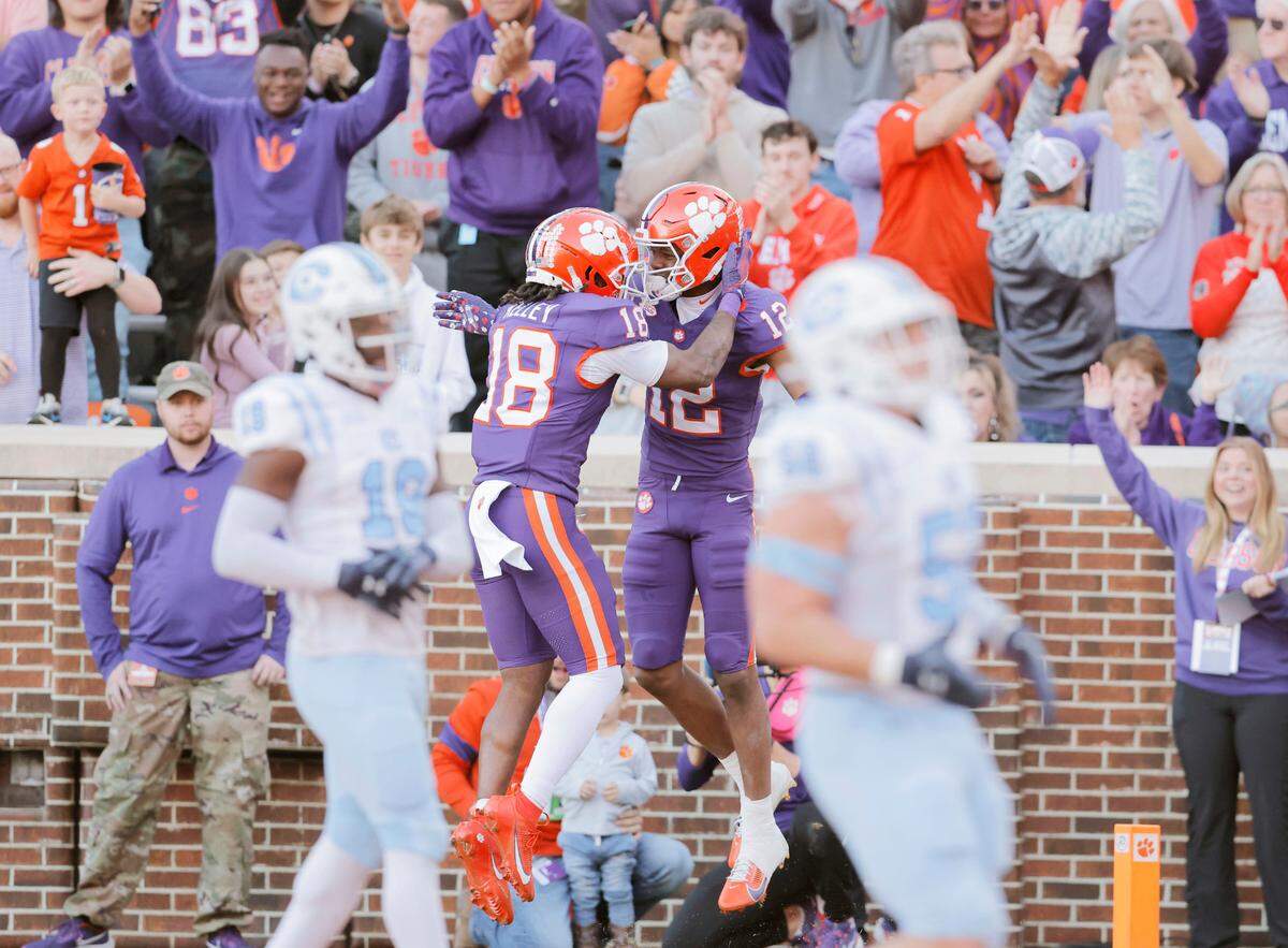 Clemson wide receiver Bryant Wesco Jr. (12) celebrates with Clemson wide receiver Misun Kelley (18) after making a touchdown catch against The Citadel during first-half action in Clemson, S.C. on Saturday, Nov. 23, 2024.