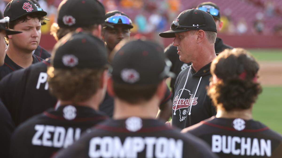 South Carolina head coach Mark Kingston speaks with his team following the Gamecocks’ game against visiting Tennessee at Founders Park in Columbia on Saturday, May 20, 2023.