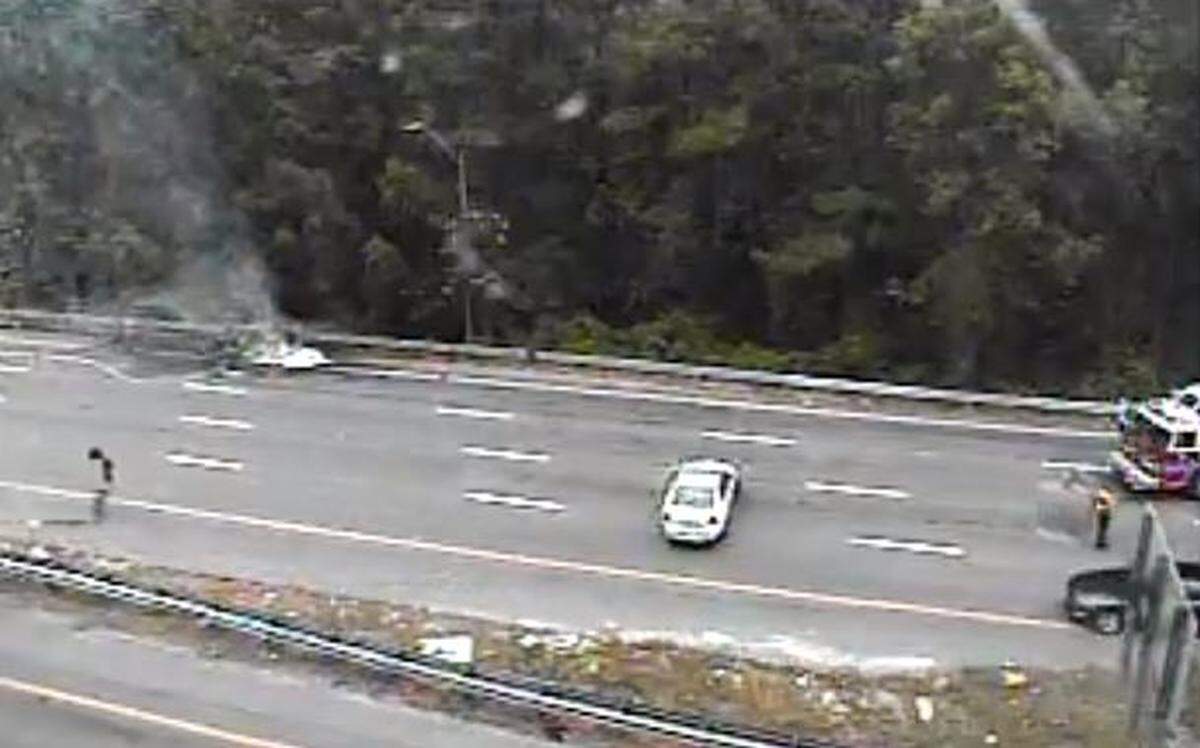 All lanes on an interstate running through Richland County were blocked by a burning vehicle, the South Carolina Department of Transportation reported.