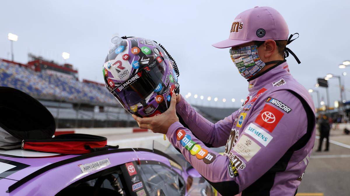 DARLINGTON, SOUTH CAROLINA - MAY 20: Kyle Busch, driver of the #18 M&M’s Fudge Brownie Toyota, puts his helmet to start the NASCAR Cup Series Toyota 500 at Darlington Raceway on May 20, 2020 in Darlington, South Carolina. (Photo by Chris Graythen/Getty Images)
