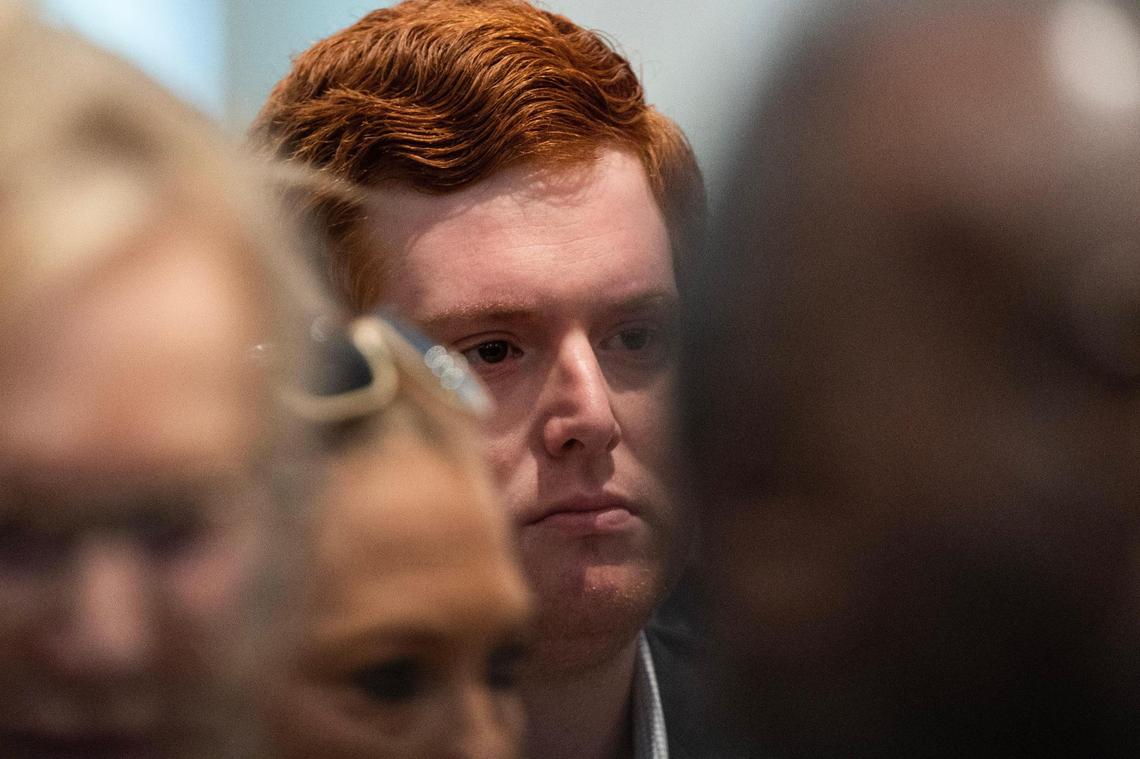 Buster Murdaugh, the son of Alex Murdaugh, listens as his father is sentenced to two consecutive life sentences for the murder of his wife Maggie and son Paul by Judge Clifton Newman at the Colleton County Courthouse on Friday, March 3, 2023. Joshua Boucher/The State/Pool