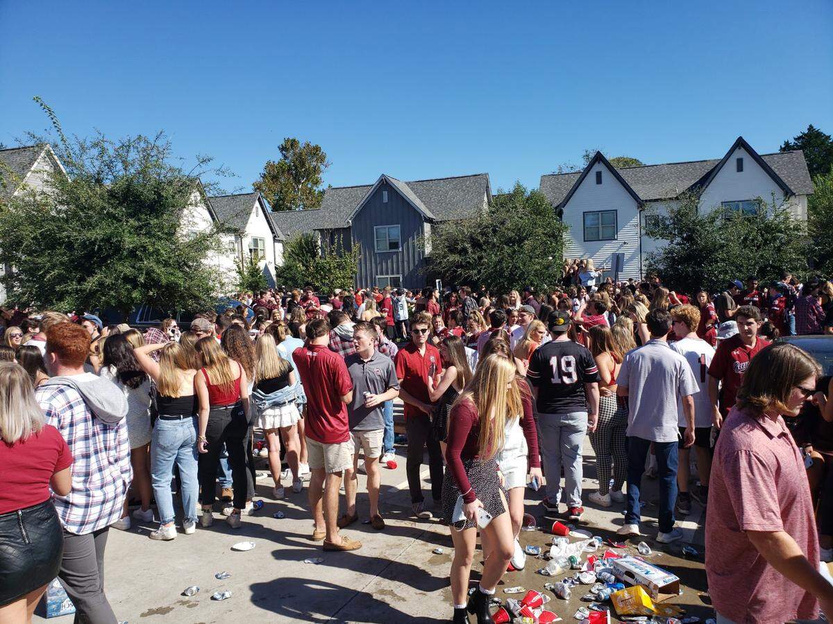 A crowd of at least a couple thousand people gathered at the Orchard rental complex, according to the Columbia Fire Department.