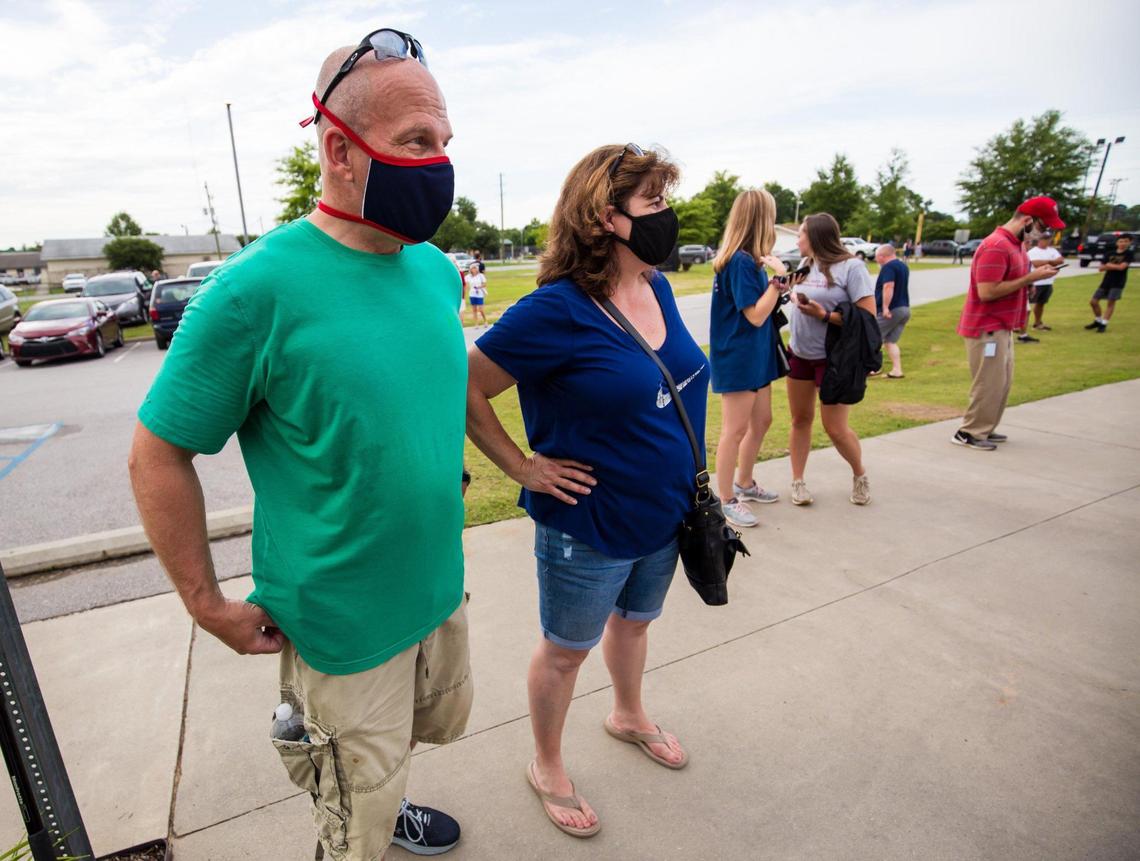 Tom and Lisa Tevins react after finding out they wouldn’t be able to attend the home opener of the Lexington County Blowfish game against the Bomb Island Bombers. The Blowfish announced a few minutes before first pitch that fans lined up to enter would not be allowed to attend. The Levins flew in from Philadelphia to attend the game to watch their son, Tatem Levins, a catcher for the Blowfish.