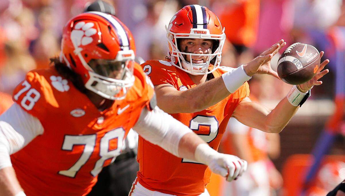 Clemson quarterback Cade Klubnik (2) takes a snap against Virginia during second-half action in Clemson, S.C. on Saturday, Oct. 19, 2024.