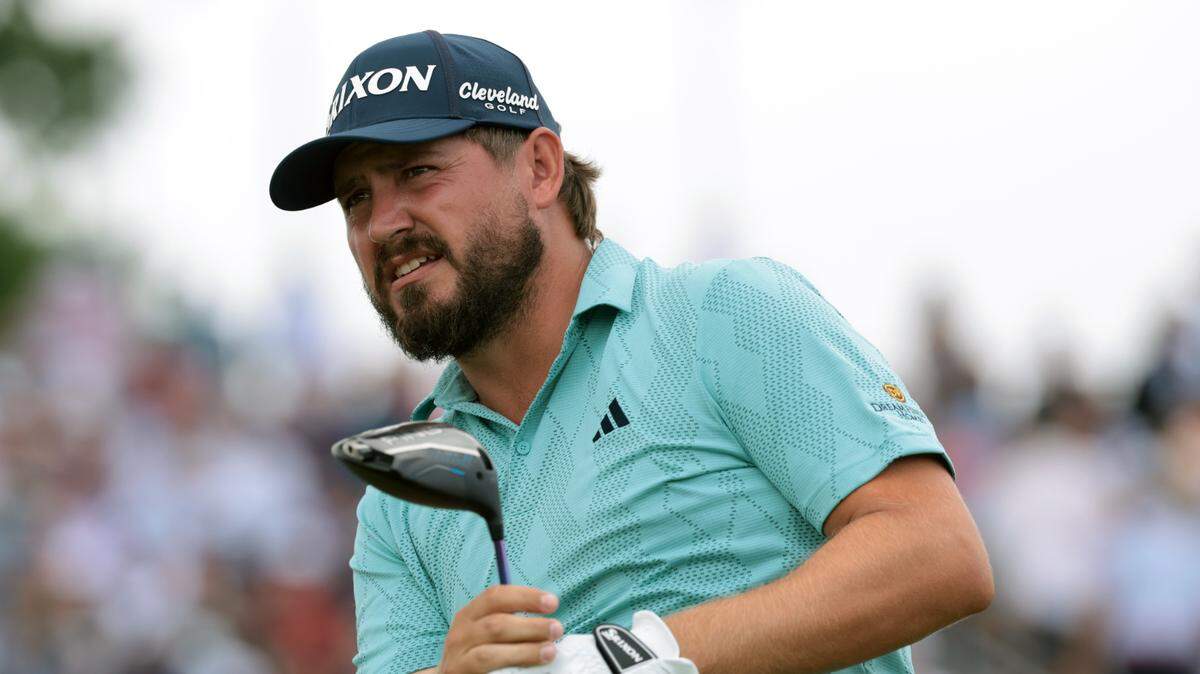 Andrew Novak plays his shot from the 12th tee during the final round of the U.S. Open golf tournament.