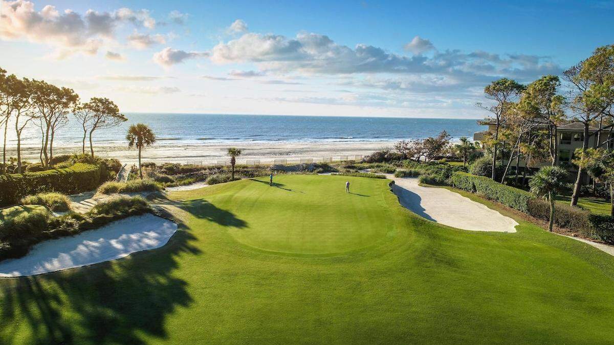 The view of a golf course and the beach from a villa in Hilton Head, currently listed as the most expensive vacation home rental in South Carolina on Vrbo.