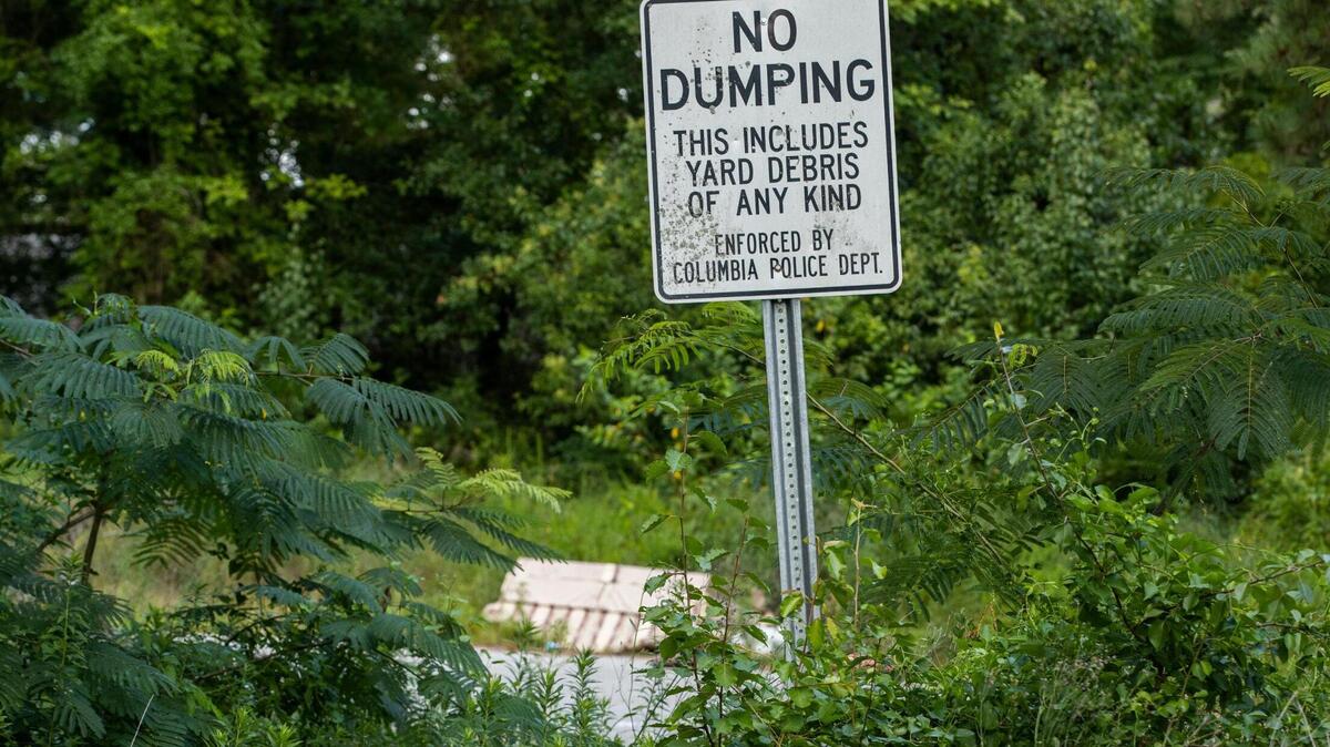 A sign warns people not to dump trash in the Belvedere neighborhood on Thursday, July 1, 2021. Diane Wiley, who owns a home in the neighborhood, says that when she and other neighbors organized to get the neighborhood annexed into the city of Columbia they hoped municipal services would improve.
