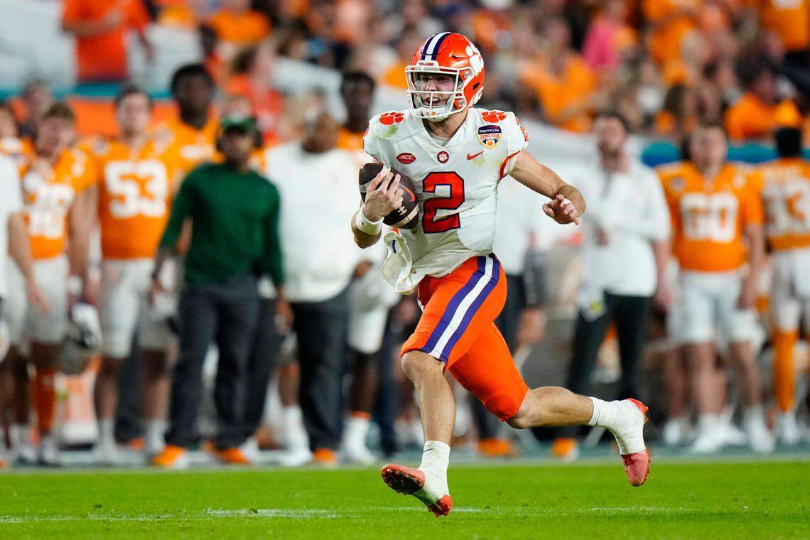 Dec 30, 2022; Miami Gardens, FL, USA; Clemson Tigers quarterback Cade Klubnik (2) runs with the ball during the second quarter against the Tennessee Volunteers in the 2022 Orange Bowl at Hard Rock Stadium.
