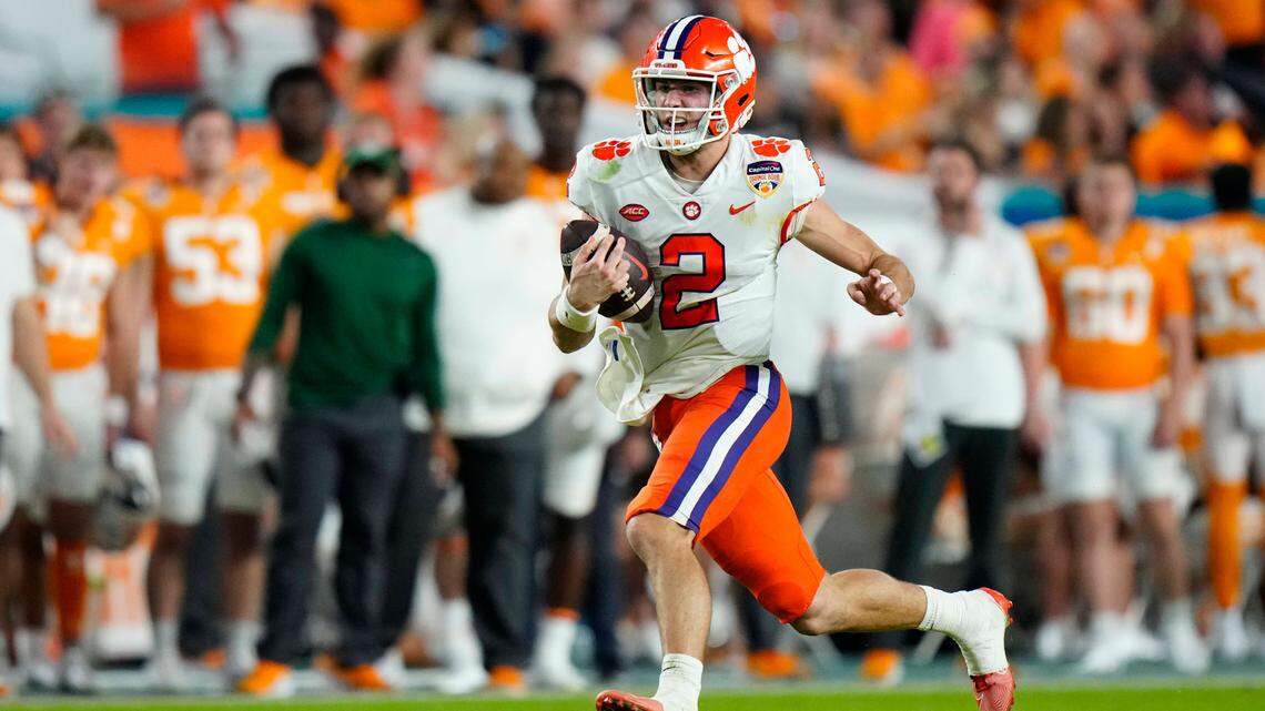 Dec 30, 2022; Miami Gardens, FL, USA; Clemson Tigers quarterback Cade Klubnik (2) runs with the ball during the second quarter against the Tennessee Volunteers in the 2022 Orange Bowl at Hard Rock Stadium.