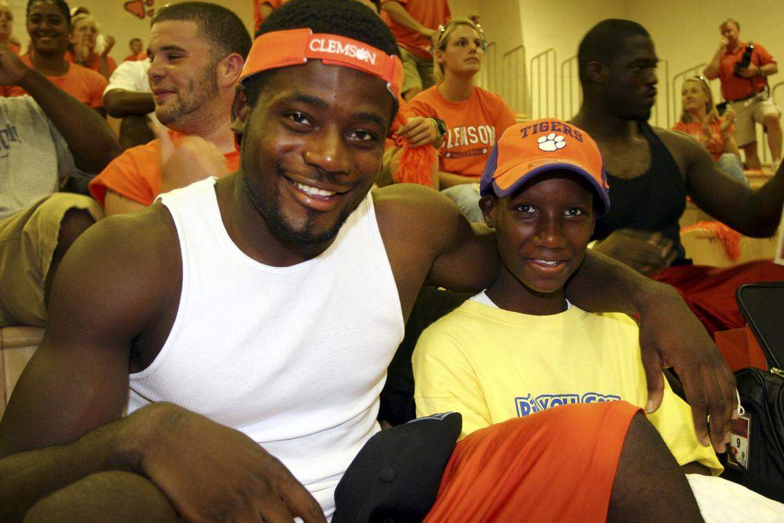 Clemson cornerback Ray Ray McElrathbey and his 11-year-old brother, Falmarr, at the USC-Clemson volleybal match on Aug. 31 Mark Crammer/Clemson University