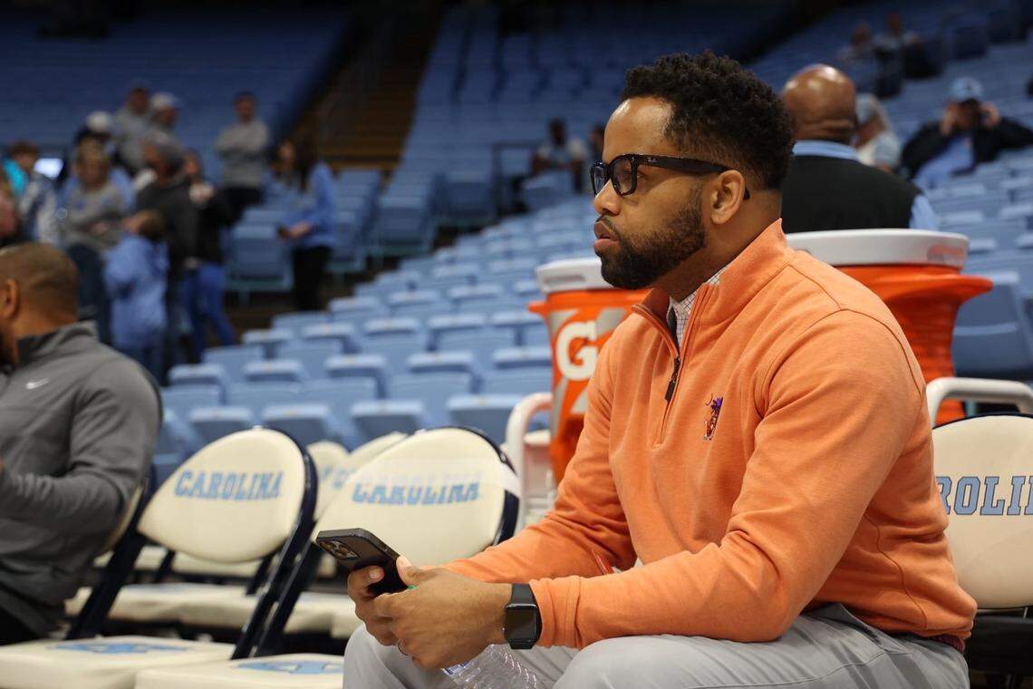 Watch a Clemson men’s basketball game on TV, and you’ll probably catch a shot of Kevin White sitting behind the team bench. As the designated sports administrator for the team, he oftens travels with the Tigers, like he did for their memorable Feb. 6 upset of then-No. 3 UNC in the Smith Center.