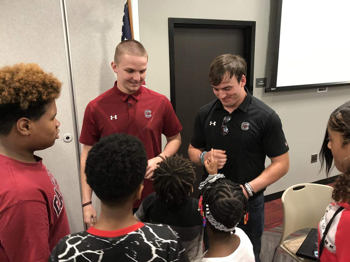 South Carolina Gamecocks football players Ryan Hilinski (left) and Spencer Eason-Riddle speak at a youth symposium for National Youth Violence Prevention Week.