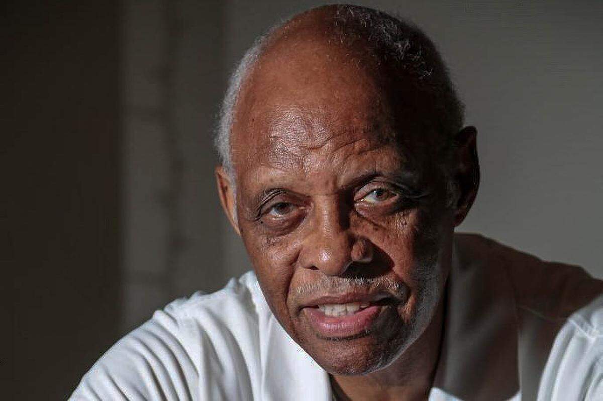 Coach George Glymph is pictured in his Columbia home in 2016.