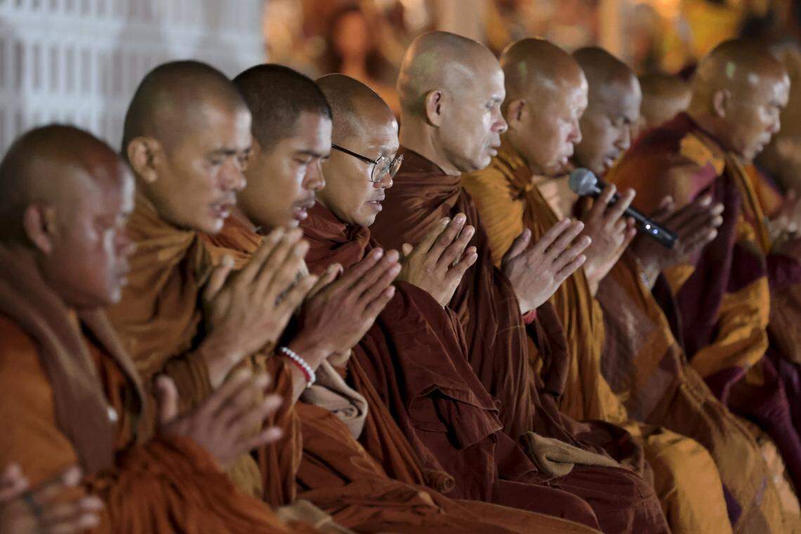 Buddhist monks with the Walk for Peace chant before speaking with a crowd gathered at Nazareth Methodist Church in Leesville, SC. The Buddhist monks Walk for Peace stopped at the church to rest overnight after speaking to the crowd.
