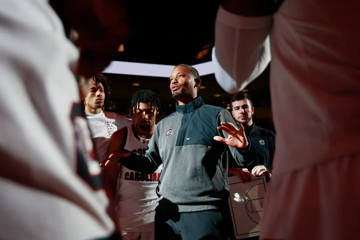 South Carolina head coach Lamont Paris speaks to his team before they play Wooster at Colonial Life Arena on Wednesday, October 30, 2024.