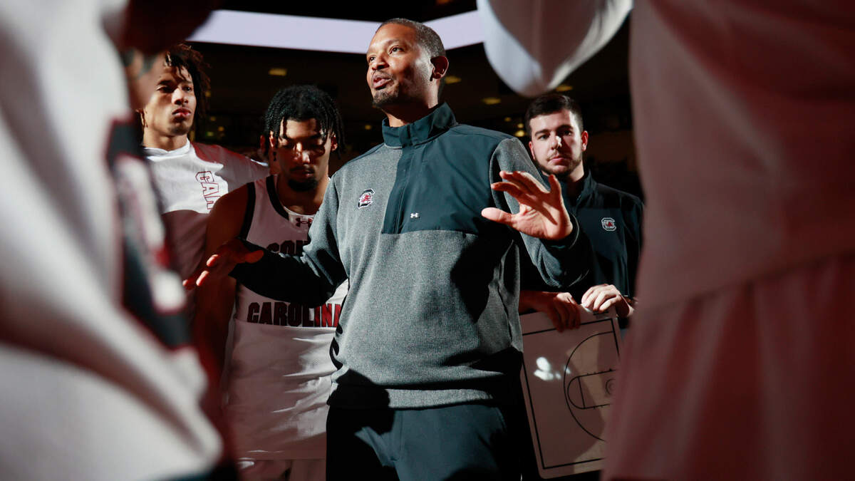 South Carolina head coach Lamont Paris speaks to his team before they play Wooster at Colonial Life Arena on Wednesday, October 30, 2024.