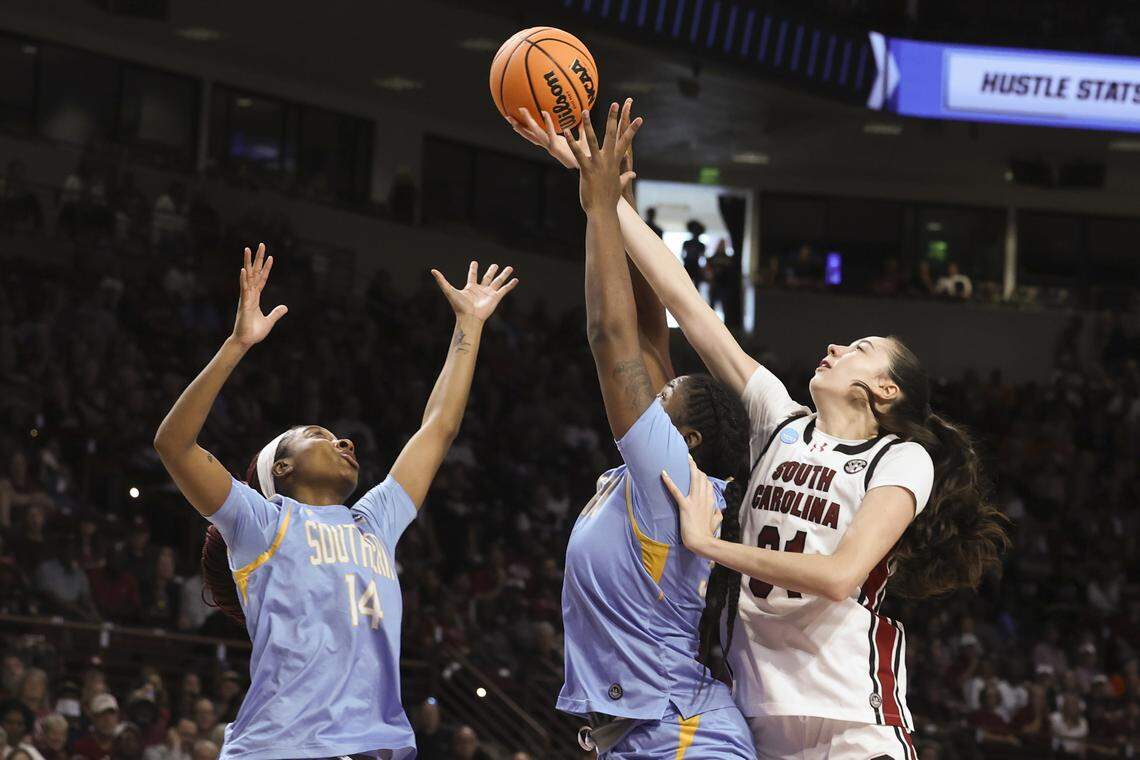 South Carolina's Alicia Tournebize (31) snags a rebound over Southern University's Jestiny Dixon (14) and Xyllize Harrison (32) during the first half of a game against Southern University in the first round of the NCAA Tournament at Colonial Life Arena on Saturday, March 21, 2026.