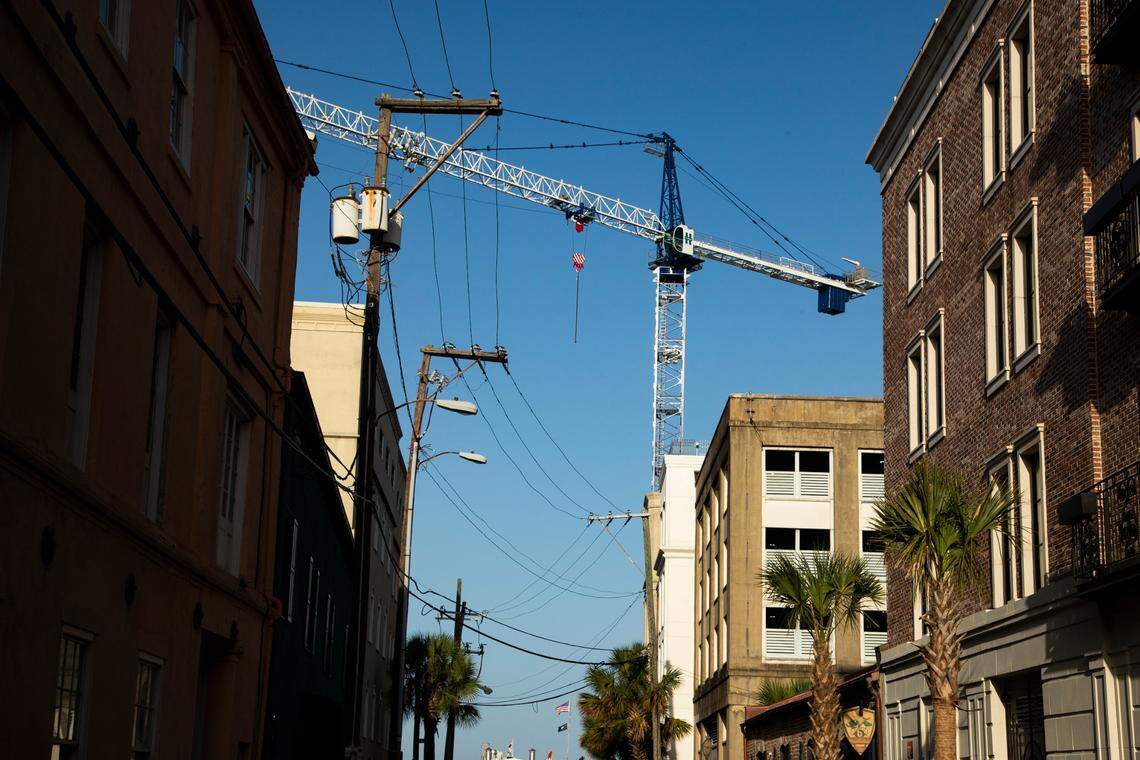A crane near some of the oldest businesses in Charleston, South Carolina on Sunday, August 29, 2021.