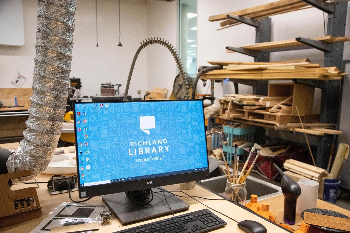 A computer that controls a Glowforge laser cutter and engraver in the woodshed at the Richland County Library Main branch on Tuesday, July 19, 2022. The library offers training on how to use the machine.