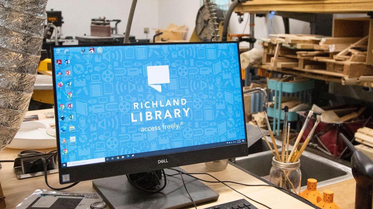 A computer that controls a Glowforge laser cutter and engraver in the woodshed at the Richland County Library Main branch on Tuesday, July 19, 2022. The library offers training on how to use the machine.