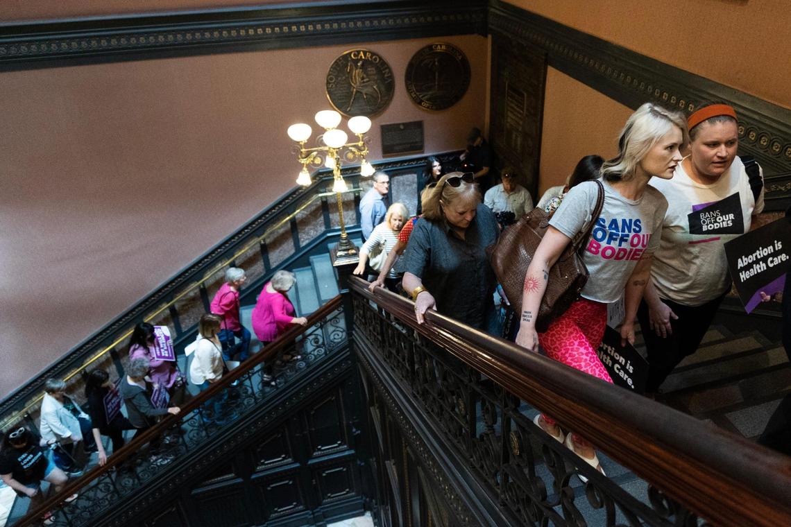 Protestors against abortion restrictions enter the South Carolina State House as the South Carolina Senate prepares to debate a bill that would ban abortion after six weeks on Tuesday, May 23, 2023.