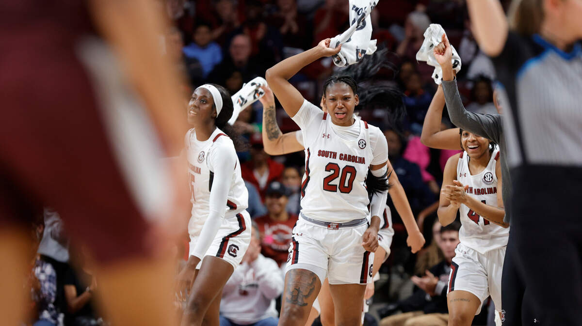 The Gamecocks celebrate a wild run during the first half of action against Texas A&M in the Colonial Life Arena on Thursday, Dec. 29, 2022.