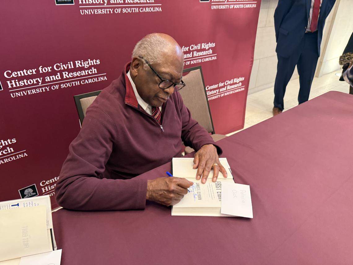 U.S. Rep. Jim Clyburn, D-SC, signs copies of his new book, “The First Eight,” at a recent talk he gave at the University of South Carolina Rice Law School.