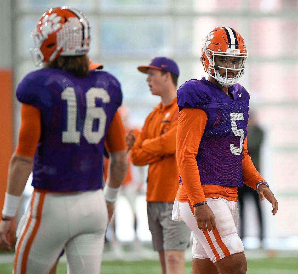Clemson backup quarterback D.J. Uiagalelei (right) has been studying Trevor Lawrence closely since arriving on campus.