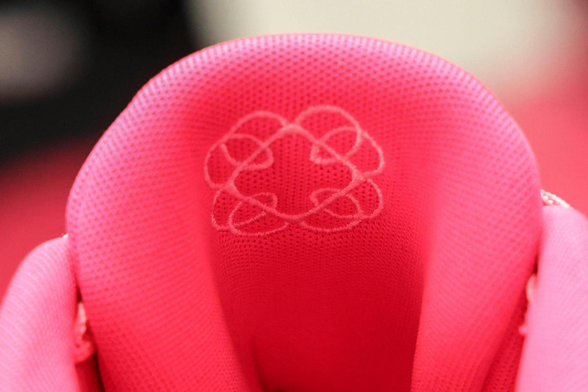 The design inside the tongue of the shoes are replicas of Wilson’s tattoos — one in honor of her mother and the other her father.
