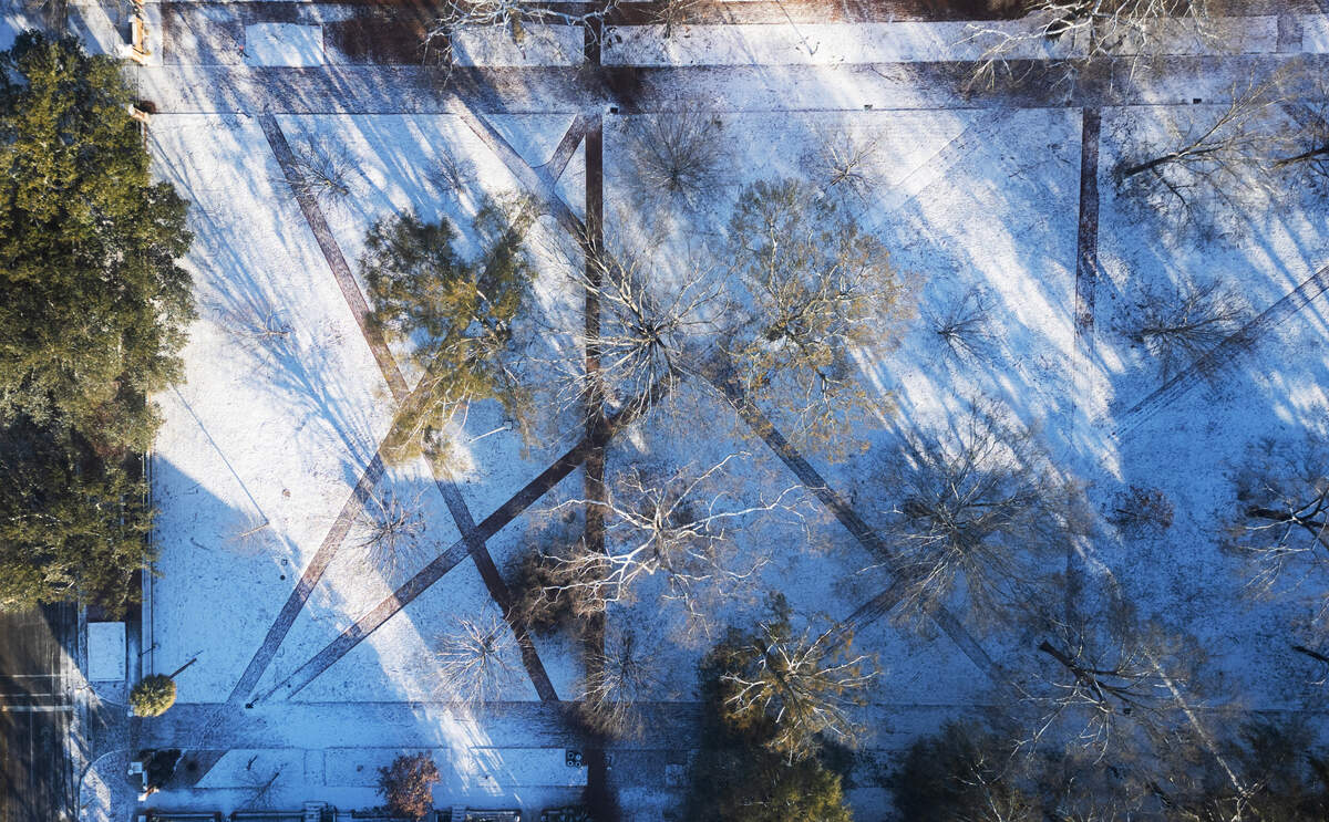 The University of South Carolina horseshoe in Columbia, South Carolina is covered in snow on Wednesday, January 22, 2025.
