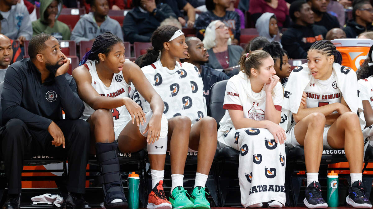 South Carolina’s Aliyah Boston (4) sits on the bench the with a boot on her foot for the second half of action against Hampton in the Colonial Life Arena on Sunday, Nov. 27, 2022.