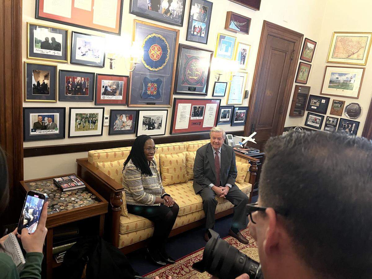 Supreme Court nominee Ketanji Brown Jackson meets with U.S. Sen. Lindsey Graham, R-S.C., on Capitol Hill on Tuesday, March 15, 2022.