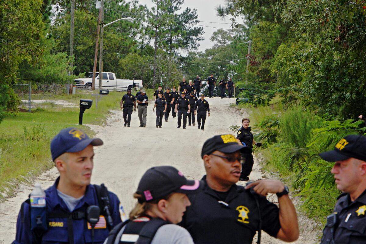 Crews conduct a search on a 2012 Tuesday morning along Smyrna Road in Elgin for missing Columbia Teen, Gabrielle Swainson. Earlier in the day it was reported that a family friend, Freddie Grant, 52, is accused of taking the girl to Elgin. He was arrested Sunday on federal weapons charges and remains in custody.