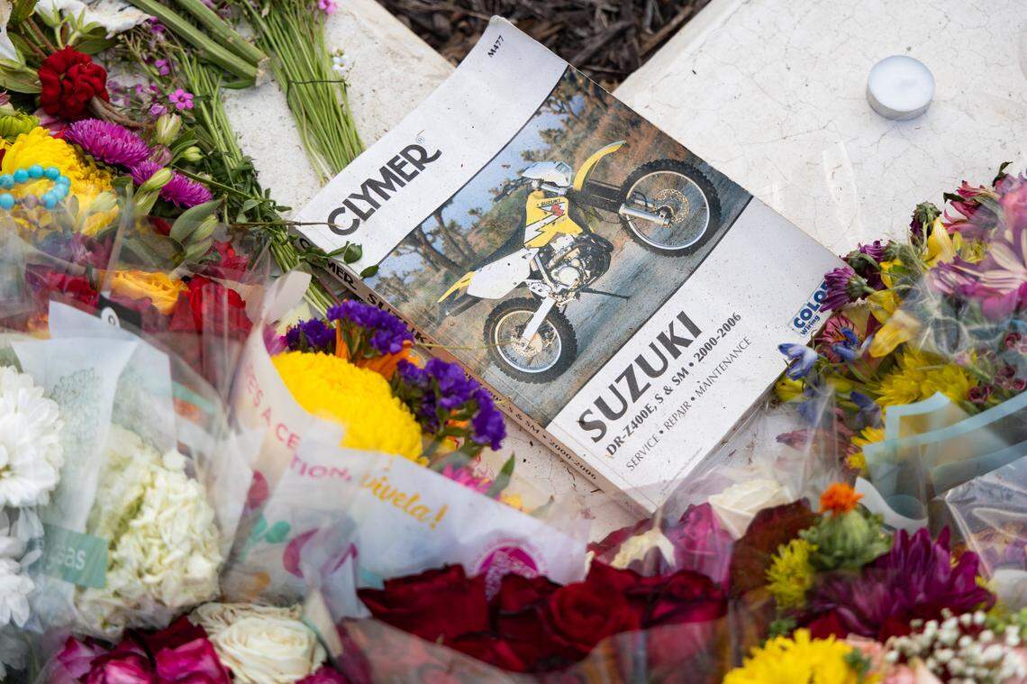 South Carolina students leave messages and flowers at a memorial for South Carolina student Nate Baker, who died after a hit-and-run crash on the intersection of Blossom Street and Assembly Street on Friday, April 4, 2025.