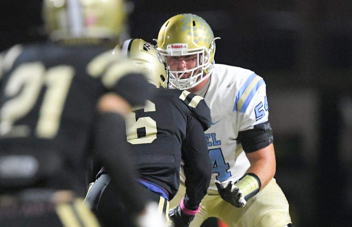 DW Daniel senior Watson Young (54) blocks a Pendleton player during the first quarter in Pendleton, S.C. Friday, October 20, 2023.